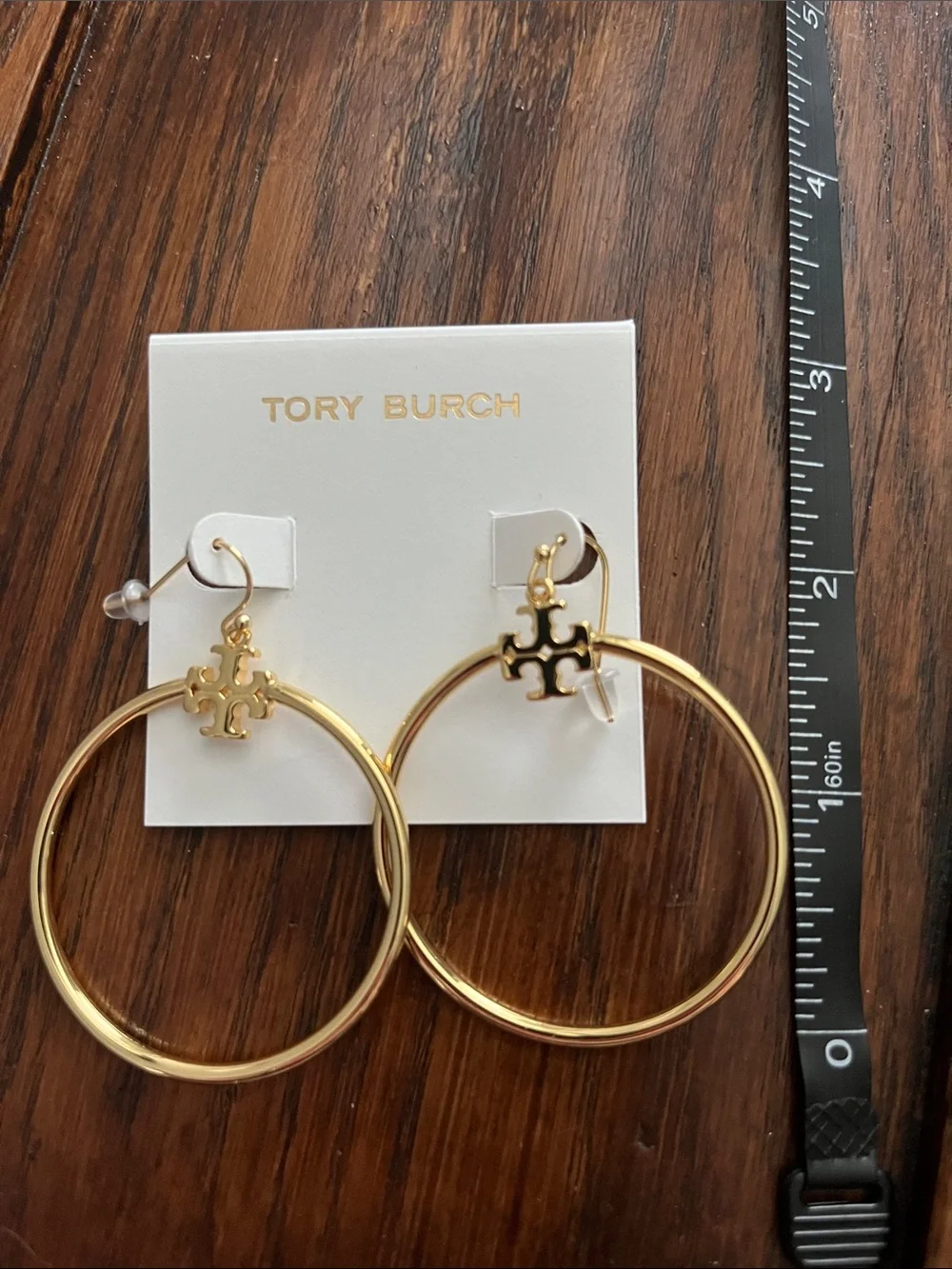 Tory Burch Polished Gold Tone Hoop Earrings with Logo Charm